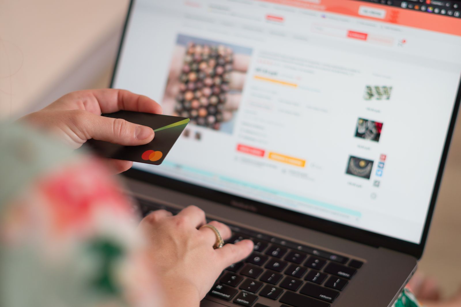 Customer shopping online and making payment checkout on laptop